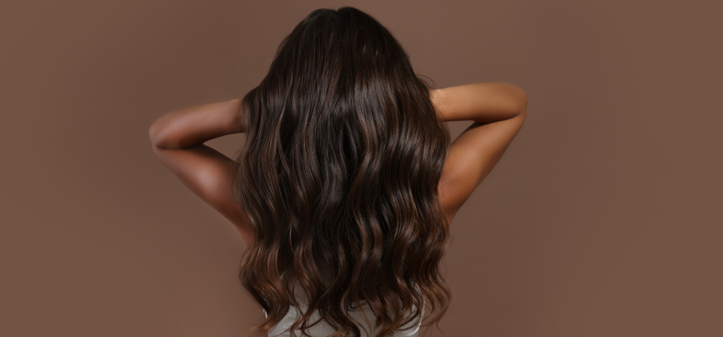 Girl showing there long hair.