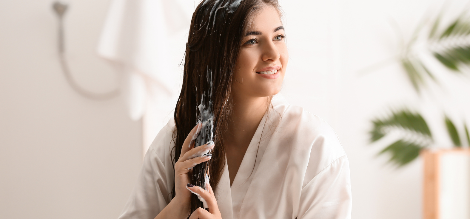 A women Applying hair conditioner