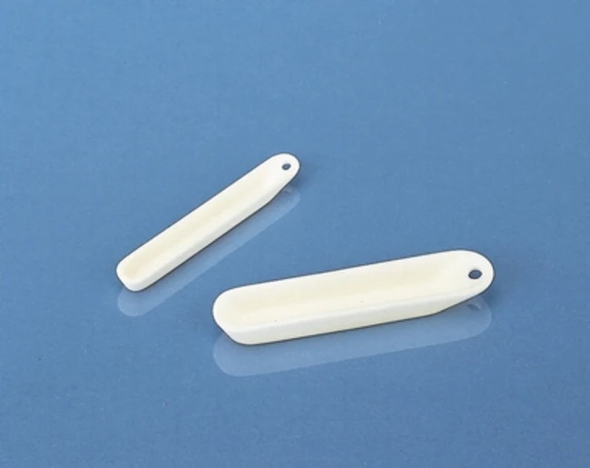 Two white Livingstone porcelain combustion boats designed for heating chemicals and performing safe experiments in a laboratory setting.