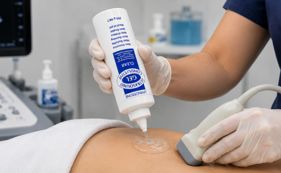 Healthcare professional applying ultrasound gel