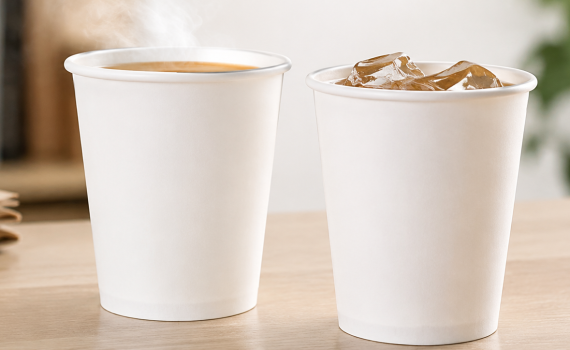 Plain white paper coffee cup used for hot and cold drinks on a clean tabletop
