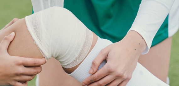 Injured man in outdoor field