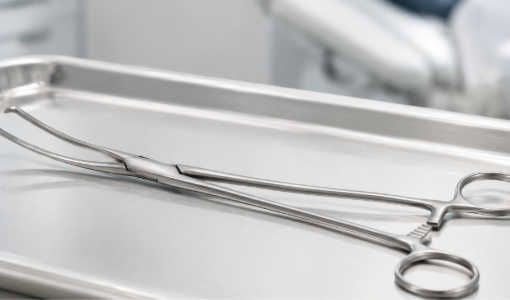 Teale uterine forceps on stainless steel tray