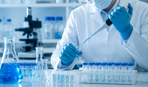 Laboratory technician preparing chemical reagents