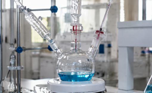 Multi-neck round bottom flasks in a research laboratory.