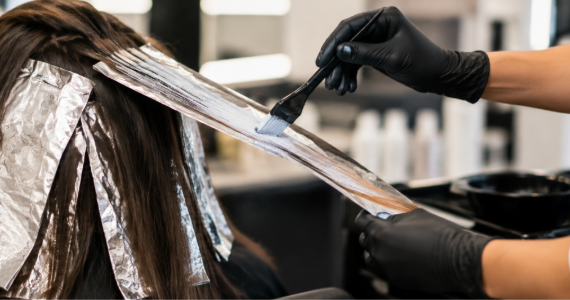 Professional hair colouring treatment in a modern salon