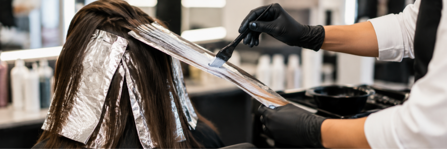 Professional hair colouring treatment in a modern salon