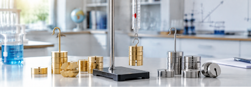 Laboratory cork stopper and cork borer tools used for making holes in corks for scientific glassware setups