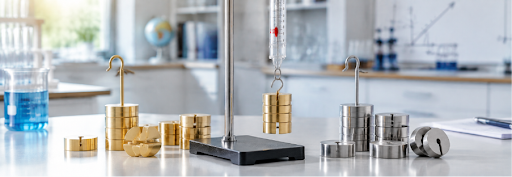 Laboratory cork stopper and cork borer tools used for making holes in corks for scientific glassware setups