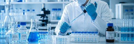 Laboratory technician preparing chemical reagents in an Australian healthcare pathology laboratory